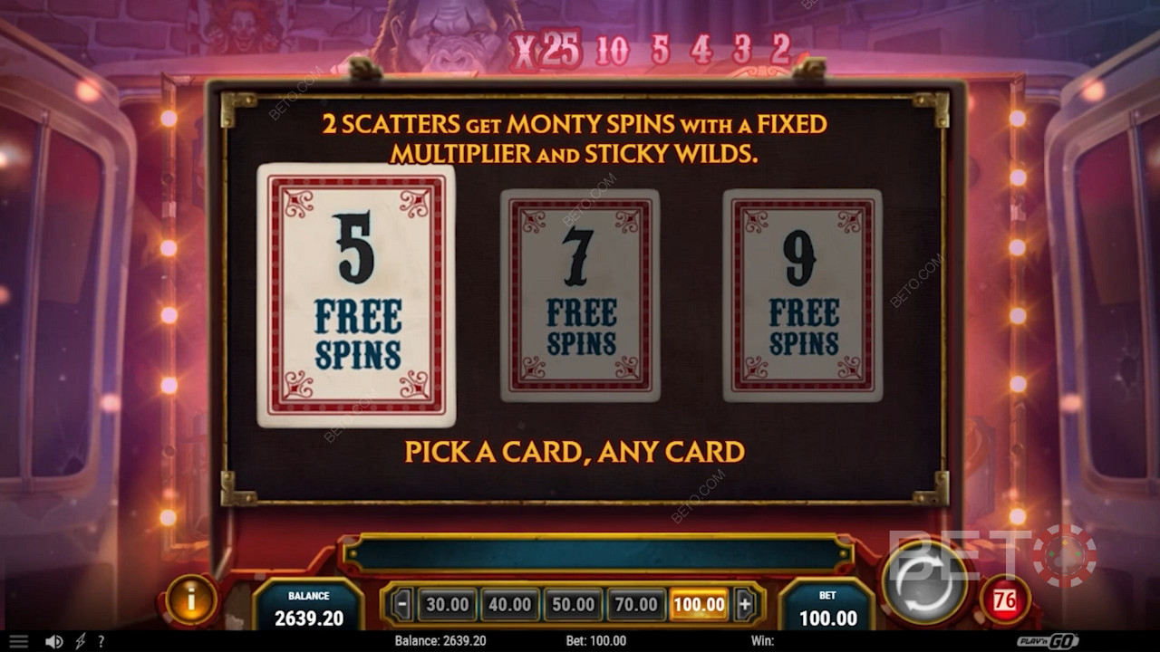 Reveal the number of Monty Spins by picking a card